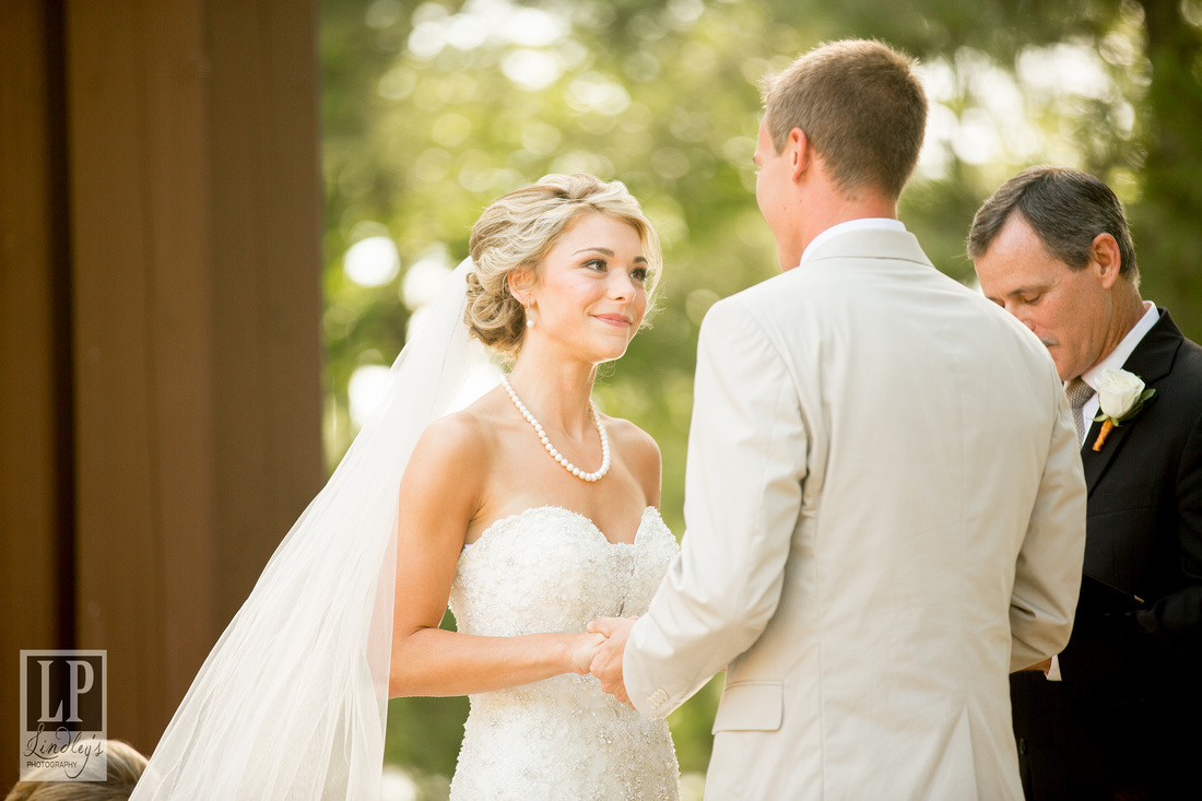 “Legacy Point at Lake Lanier Islands,”
“www.lindleysphotography.com”, “478-284-9452”
“Coordinator  Jackie Raes”, “Smooth-Tie-The-Knots”,
“Hair & Makeup”, “Brushworx” 
Flora,l “Design House Weddings”,
“Event Design and Décor”, “Hankal Events”
